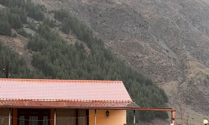 Kazbegi Casa | A Private Guest House in a secluded area by the river, surrounded by mountains.