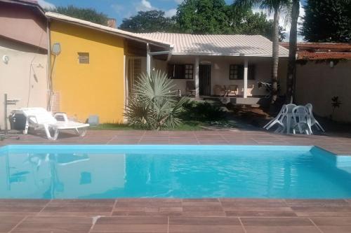 Mateus Leme Casa | Casa de campo agradável com piscina aquecida